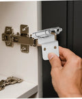Installing silent self-closing cabinet hinges on a door