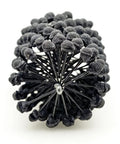 Front view of a 3-inch ball hone brush with black silicon carbide abrasive spheres
