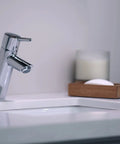 Talis S Modern Timeless Easy Clean 7-Inch Tall Bathroom Sink Faucet 1-Handle Chrome Finish, next to soap dish on sink