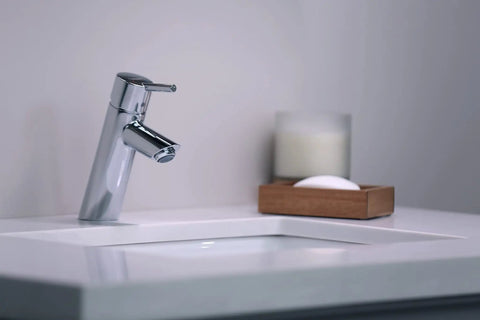 Talis S Modern Timeless Easy Clean 7-Inch Tall Bathroom Sink Faucet 1-Handle Chrome Finish, next to soap dish on sink