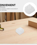 White toe stop for roller skates replacement high grip brake pad on a wooden table for easy install inline and quad skates.