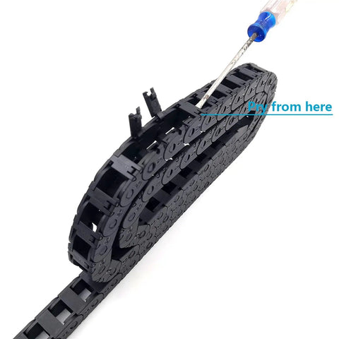 Heavy Duty 1 Meter 10x11mm Cable Drag Chain Bridge For Engraving Machines And Roller Tanks Silent Motion Transmission R28 Exterior Grade with screwdriver inserted.