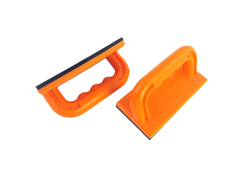 Two brightly colored 2 Pack Safety Push Blocks With 3 X 6 Inch Friction Pads for Table Saw Router Shaper Bandsaw and Jointer, top view