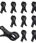 Ditch The Struggle With This 10 Pack Of Premium Black Arch Clips. Black plastic spring clamps shown in 10-pack on white background.