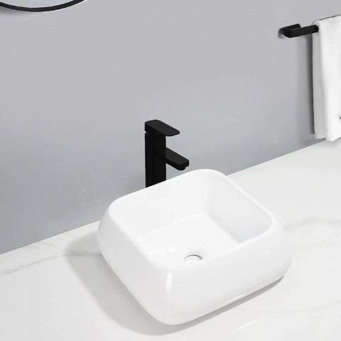 USZWBY Vessel Sinks Modern Minimalist Creative Sink Home Art Above Counter Basin Balcony Bathroom Ceramic Wash Bathroom Bowl Sink with black faucet in modern bathroom setting.