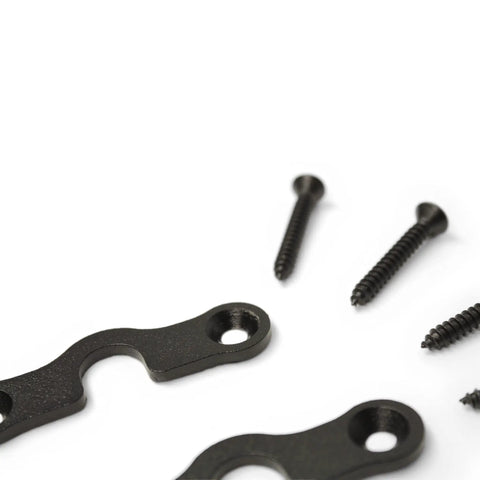 Close-up of black screws and steel clips from Heavy Duty Sun Visor Repair Kit With Steel Clips For Jeep Wrangler JK 2018 Through 2024 And Gladiator 2020 Through 2024