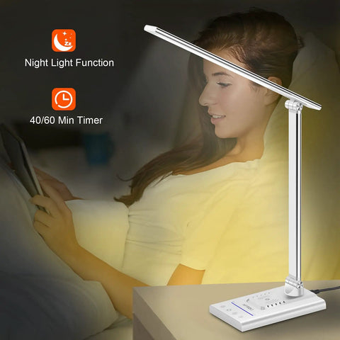 Dope All In One LED Desk Lamp With 15W Fast Wireless Charging And USB Port next to a person reading, showing night light function.