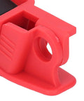 Close-up of a red component from Six Piece Circuit Breaker Lockout Tool Kit With Serrated Jaws For Electrical Safety Lockout Tagout System.