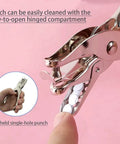 Circle Hole Punch Kit With One Quarter And One Eighth Inch Sizes Handy Handheld Puncher showing cleanup in hinged compartment