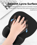 Hand using Ergonomic Mouse Pad With Wrist Rest Memory Foam For Computer, Home Office And Gaming, Non Slip Base, Dense Surface For Precise Tracking.