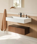 HAOCHRYSYPH Wall Mount Sink, Solid Surface, Matte White, 36 x 18 in. in modern bathroom setting with natural decor.
