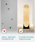 Comparison of wall mount damage vs. Dope Portable Skateboard Floor Stand With Dual View Display Show Front Or Back, black stand utilizes floor space.