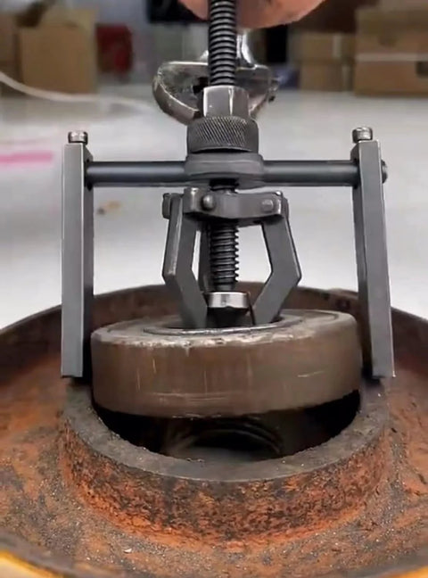 Inner Hole Bearing Puller with Three Claw Design in action removing a bearing from an engine component