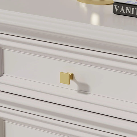 Solid As Nails 5 Pack Square Cabinet Knobs Brushed Brass Finish Zinc Alloy Drawer Handles on a white dresser drawer.