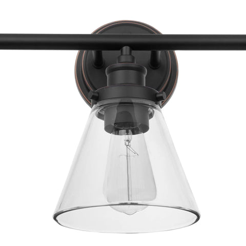 Close-up of clear glass shade on Three-Light Vanity Fixture in oil rubbed bronze for over-mirror bathroom, powder room, makeup mirror lights.