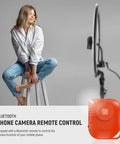 18 Inch Ultra Thin Ring Light With Tripod Stand And Phone Holder For iPhone, 45W Remote Shutter, woman using light