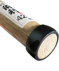 Close-up of the white oak handle of a Japanese Wood Chisel 1.65 Inch Wide Blade For Woodworking Pro Grade Carbon Steel Made In Japan