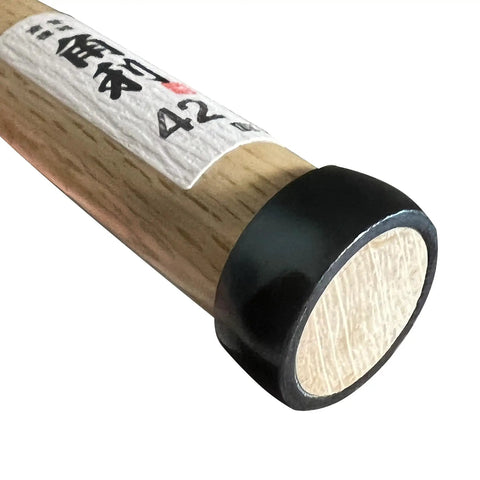 Close-up of the white oak handle of a Japanese Wood Chisel 1.65 Inch Wide Blade For Woodworking Pro Grade Carbon Steel Made In Japan