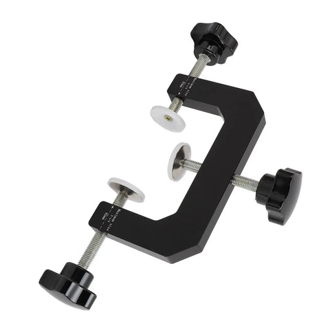 Heavy Adjustable Woodworking Face Clamp Delivering Total No Sweat Aluminum Grip Cabinet Edge Tool Built Badass For Pro Carpenters And Serious Diy Crews On Sites, showing black metal clamp with white pads.