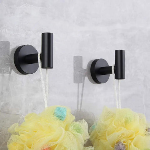 Two wall-mounted robe hooks from 5 Piece Bathroom Accessories Kit In Brushed Stainless Steel Wall Mounted Hardware Set With 24 Inch Double Towel Bar, 12 Inch Hand Towel Bar, Toilet Paper Holder, And Two Robe Hooks For A Sleek Home Upgrade.
