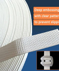 Heavy Duty Hand Grade Polypropylene Strapping Coil Delivering Knockout 130 Pound Break Strength And Three Twenty Eight Feet Of Smooth White Strapping with embossed pattern.