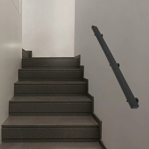 Rock Solid Flush Wall Mount Stair Handrail Built Like A Tank Using Premium Stainless Steel With Beast Mode Two Hundred Pound Load Rating And A Clean Modern Profile Designed To Last Forever on a staircase.