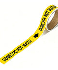 Domestic Hot Water Pipe Label Roll With Self Sticking Markers, 1 Inch High By 8 Inch Wide Yellow Plastic Film, Easy Peel And Apply, 25 Labels Per Roll For A No Fuss, Quick Identification Of Pipes. Yellow self-adhesive roll with black text for hot water pipes.