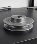 Heavy Duty Cast Iron V Belt Pulley 100 Mm Od Single Groove on a workbench, showcasing 19 Mm Bore and 6Mm Keyway design.