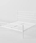 Built Tough Full Size Metal Bed Frame With Classic Headboard And Footboard In Crisp White featuring a clean design and steel slats.