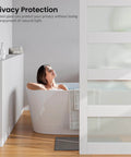 Side view of bathroom with White Glass Barn Door Slab 28 By 84 Inches With Frosted Glass, PVC Surface next to a freestanding tub.