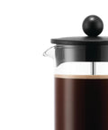 Close-up of 12 Ounce Brazil French Press Coffee Maker with high heat borosilicate glass carafe and black handle for rich brews