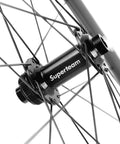 Close-up of hub on Dope Carbon Road Bike Disc Brake Wheelset 700c Clincher 60mm Deep 23mm Wide Transparent Rim Finish