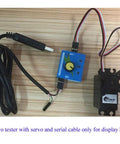 3CH RC Servo Tester And ESC Signal Generator with cable and servo on wooden table