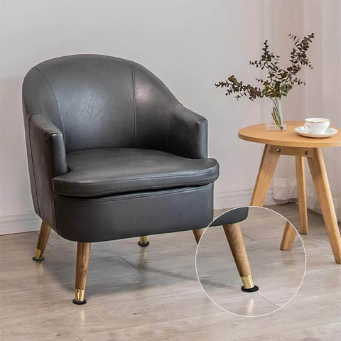 Black chair with wooden legs using self adhesive neoprene foam sheets for vibration dampening on hardwood floor