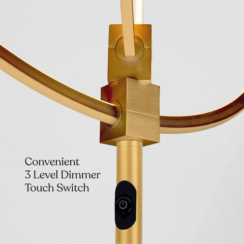 Close-up of gold and brass adjustable rings and dimmer switch of Eclipse Dope Bright Modern LED Torchiere Floor Lamp with Built In Touch Dimmer.