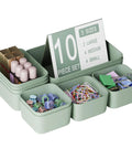 Green Plastic Drawer Organizer Set, 10 Piece Storage Bins with cosmetics and office supplies shown in three sizes