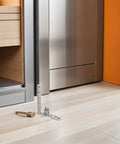 Double Swing Saloon Door Hinge With Gravity Return And Self Closing Spring Loaded Mechanism installed on wooden floor