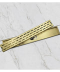 60 Cm Heavy Duty Square Invisible Floor Drain For Bathrooms And Showers Gravity Self Closing Stopper in gold on marble surface.