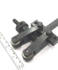 Pro Grade Spring Loaded Clamp Type Knurling Tool For Lathes With Two Inch Capacity, adjustable, shown with ruler for scale.