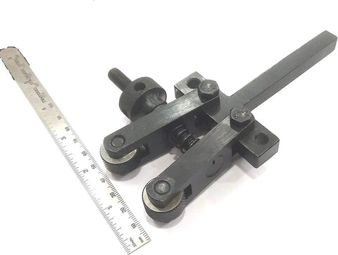 Pro Grade Spring Loaded Clamp Type Knurling Tool For Lathes With Two Inch Capacity, adjustable, shown with ruler for scale.