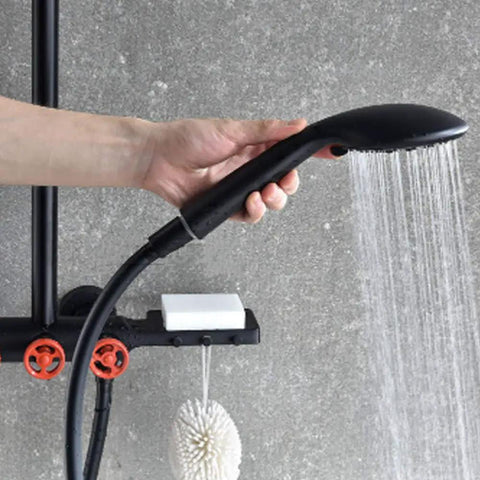 Black handheld shower head from CUTPOIY Shower Set, Wall Bathroom Shower Mixers, 10 Inch-A, with water flow against a wall.