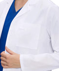 Womens Lab Coat With Three Pockets Medical Lab Coat For Science Chemistry And College White Medium All Day Comfort Breathable 65 Polyester 35 Cotton Twill Quick Dry Low Wrinkle Easy Care Professional Fit showing pocket detail