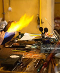 Person using 12 Inch Borosilicate Glass Tubes 12mm Diameter 2mm Wall Thick Clear Tubing For Glass Blowing Crafting And Experiments