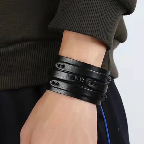 Two Piece Punk Leather Cuff Bracelet Set Vintage Wristband For Men And Women, adjusted black leather wristbands on wrist.
