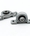 Two Pack Zinc Alloy Pillow Block Bearings Fits Shafts Eight To Twenty Mm Featuring Self Aligning Inner Design For Smooth Rotation Across Machines