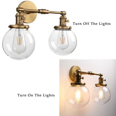 Industrial Style Double Wall Sconce Light, Hardwired, 5.9 Inch Round Clear Glass Shade, On Off Switch, brass finish, E26 socket.