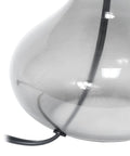 Close-up of clear glass base detail of Small Glass Raindrop Bedside Table Lamp With Clear Glass Base And White Fabric Shade Easy Rotary Switch Open Bottom Base Uses 40W Bulb Cozy Nightstand Vibe Lighting For Bedroom Or Living Room.