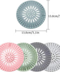 Slick Rubber Drain Stopper And Hair Catcher For Showers, Baths, And Kitchen Sinks, 5 round rubber strainers in pastel colors.