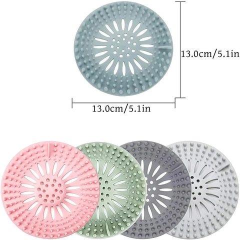 Slick Rubber Drain Stopper And Hair Catcher For Showers, Baths, And Kitchen Sinks, 5 round rubber strainers in pastel colors.