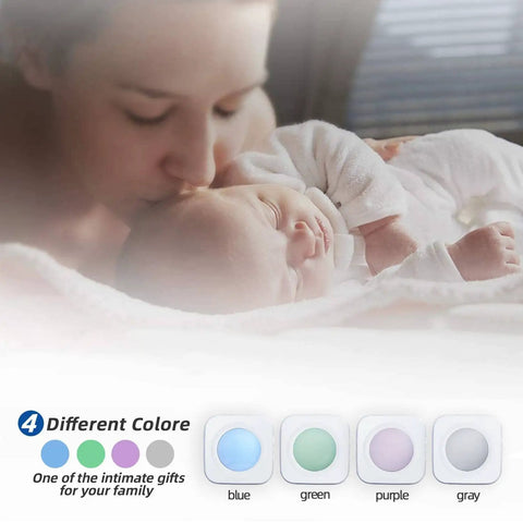 Close-up of mother kissing sleeping baby, text showing color options for wireless doorbell, Long Range Wireless Doorbell Kit.